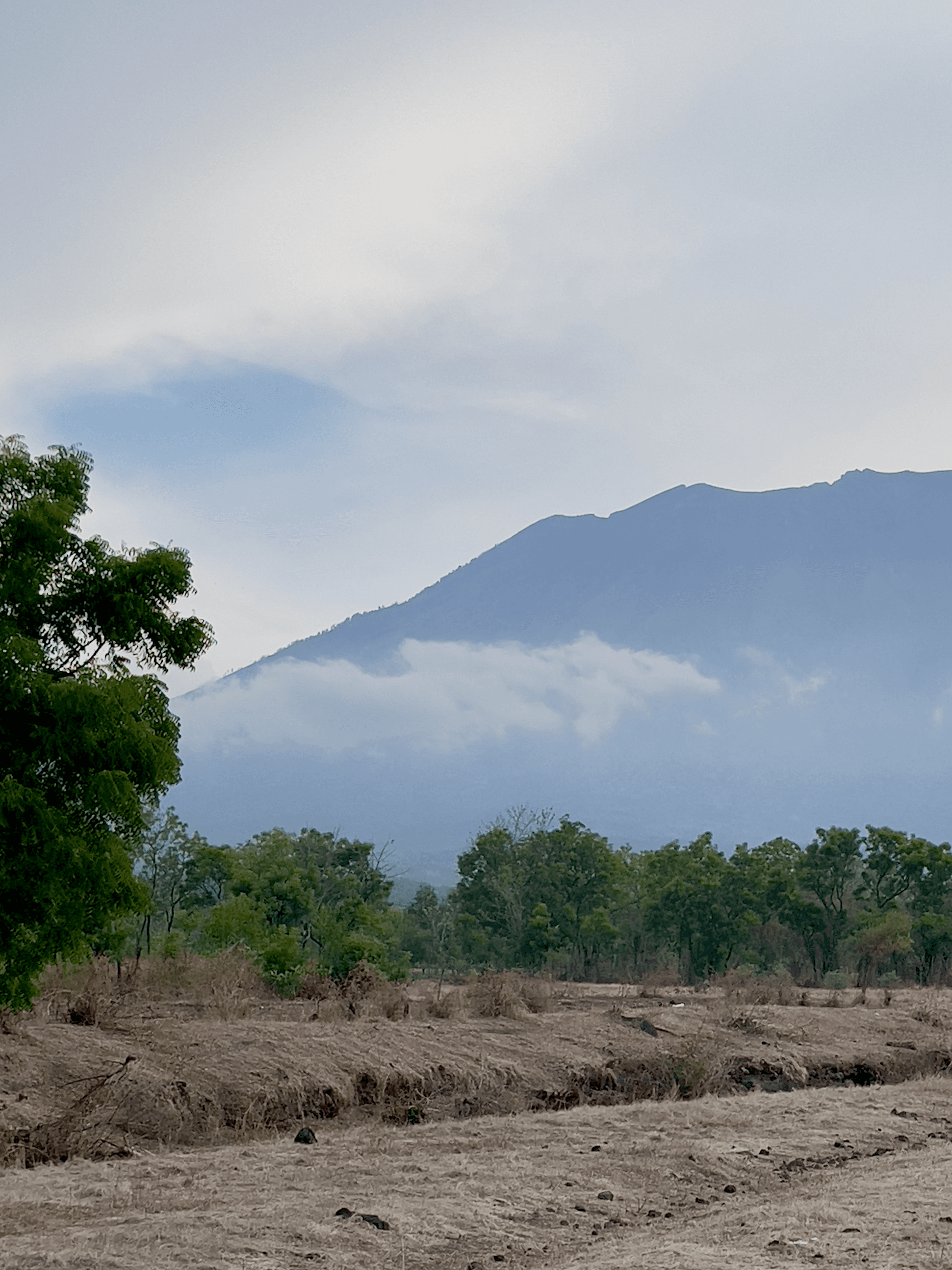 Mount Agung volcano in Bali, Indonesia with clouds and sky